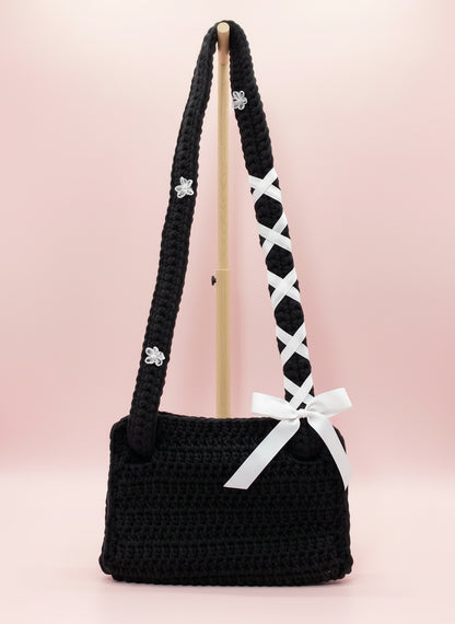 Black crochet bag with white ribbon 